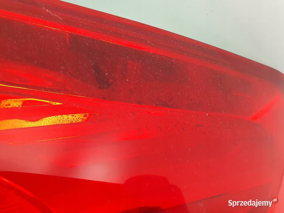 LAMPA PRAWA Opel Astra J IV HB 0915r TYLNA prawy Rudka