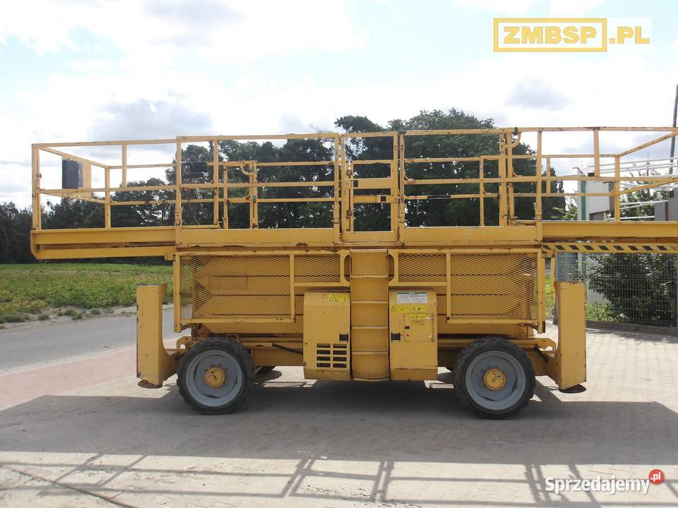 Podnośnik nożycowy spalinowy 4x4 Genie GS4390 RT Dźwigi, podnośniki Pleszew