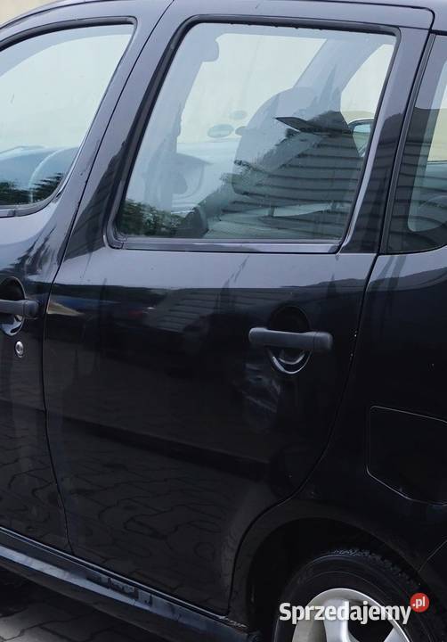 ZAMEK DRZWI LEWY TYŁ DAIHATSU YRV M200 wielkopolskie Nowy Tomyśl sprzedam