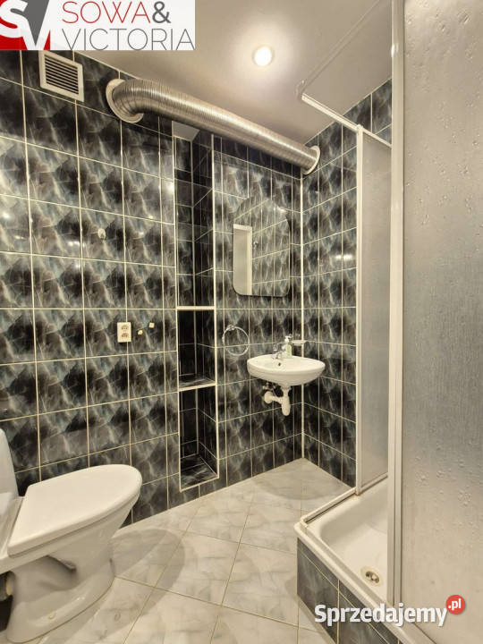 Funkcjonalna kawalerka w zielonej części