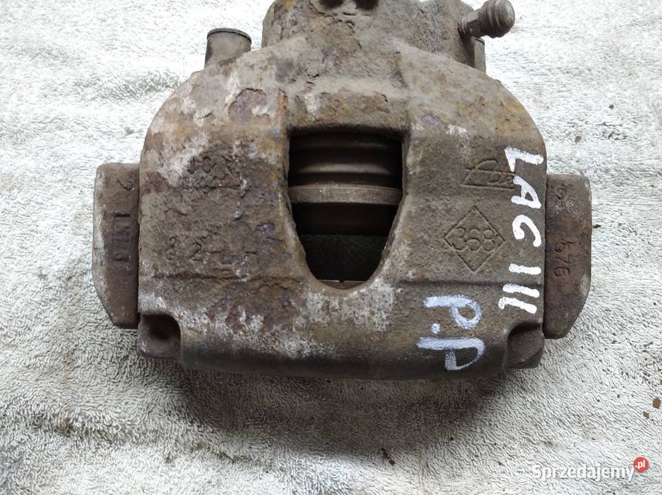 Laguna III zacisk hamulca prawy przód wielkopolskie Swarzędz