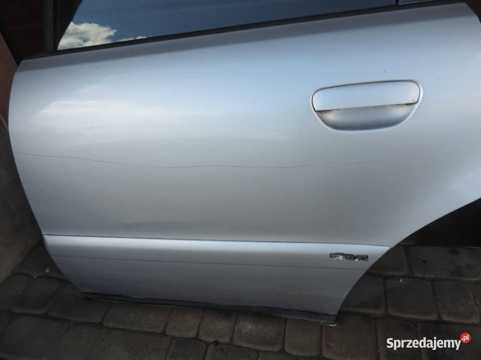 Drzwi lewy tył Audi A4 B5 kombi LY7W części blacharskie Nowy Sącz