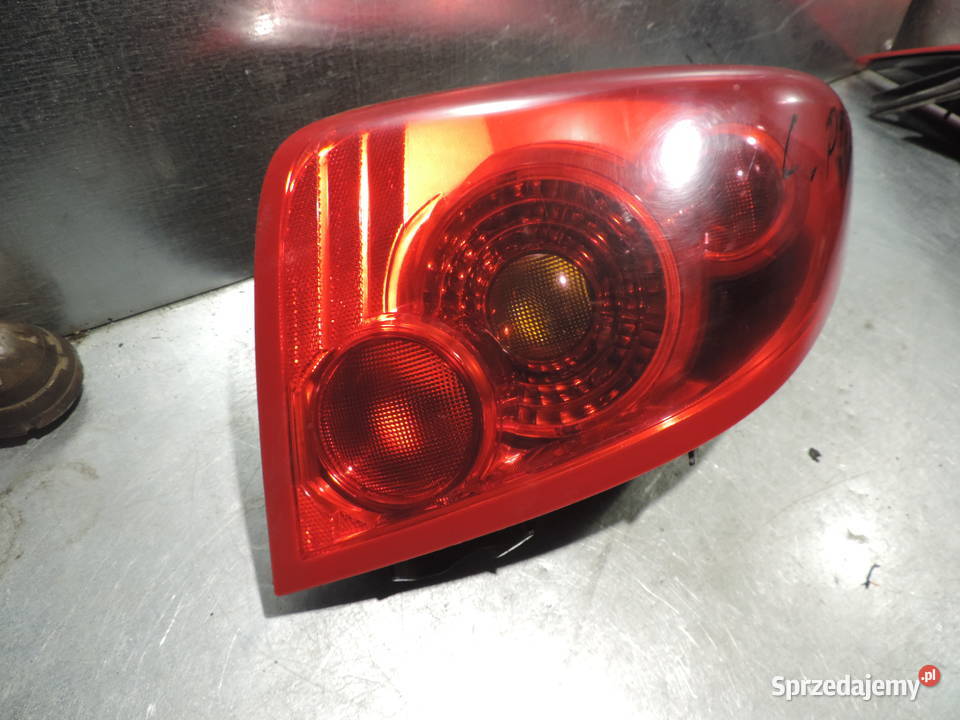 LAMPA LEWY TYŁ NISSAN PRIMERA P12 HB