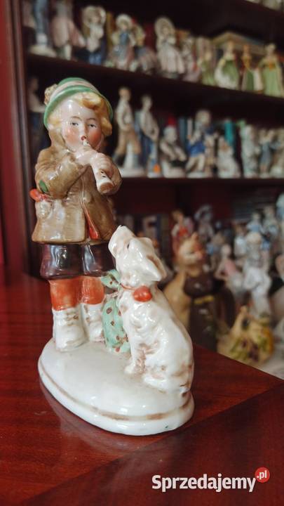 Figurka chłopca grającego na flecie pieskowi Gdańsk