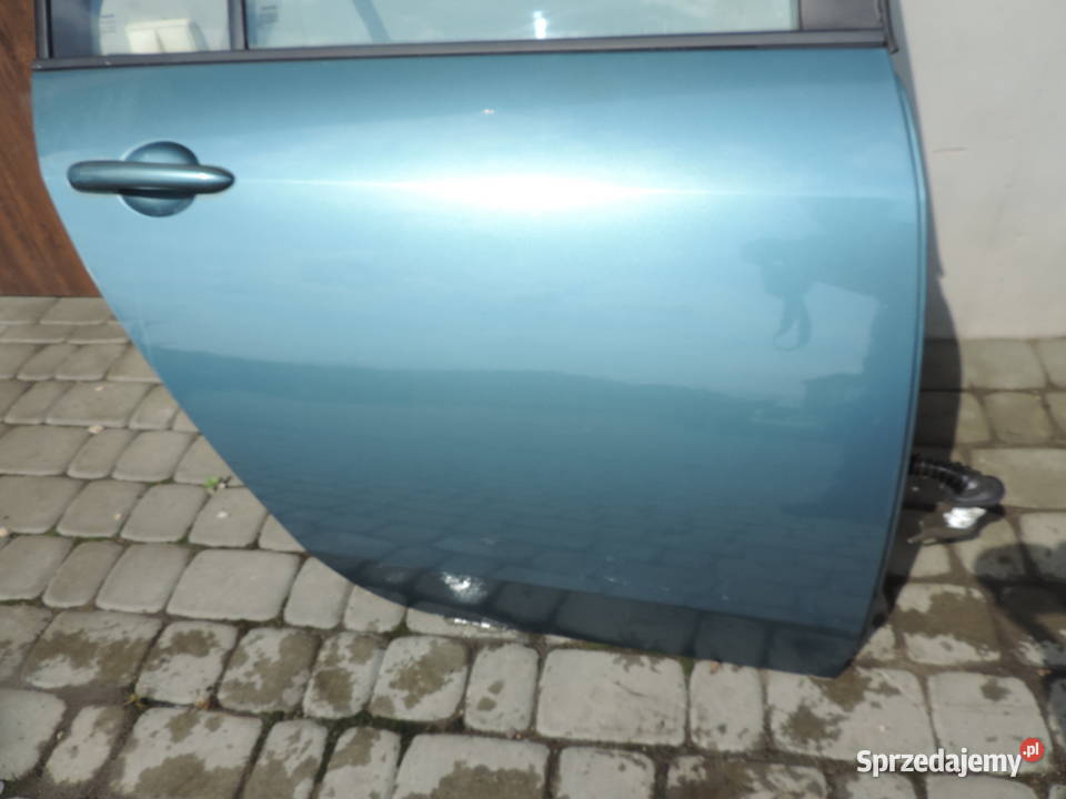 NISSAN PRIMERA P12 SEDAN DRZWI PRAWY TYŁ BY4G Karoseria Nowy Sącz