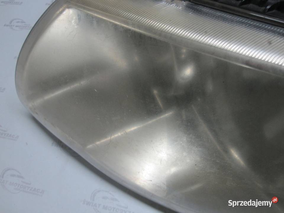 GRAND VOYAGER IV 06r lampa lewa przód 04857833AC