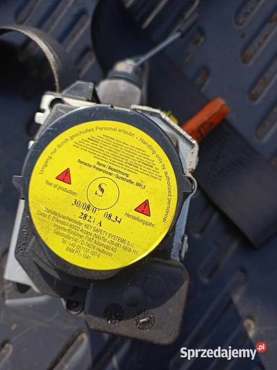 Pas bezpieczeństwa napinacz lewy przód Alfa Szczecin