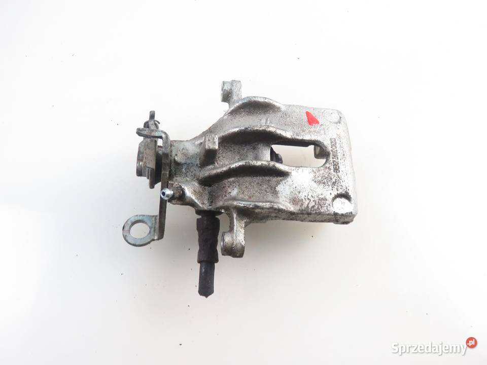 ZACISK LEWY TYŁ FORD FOCUS MK1 Turnier 18 16V