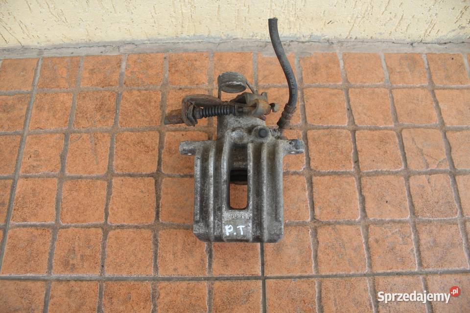 ZACISK HAMULCOWY PRAWY TYŁ AUDI A4 B6 25 TDI Części samochodowe wielkopolskie