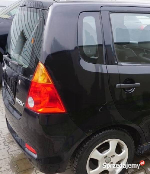 BŁOTNIK PRAWY TYŁ DAIHATSU YRV M200 osobowe wielkopolskie Nowy Tomyśl