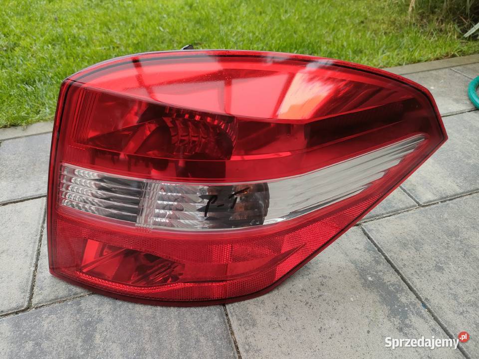 Laguna III kombi lampa ty osobowe