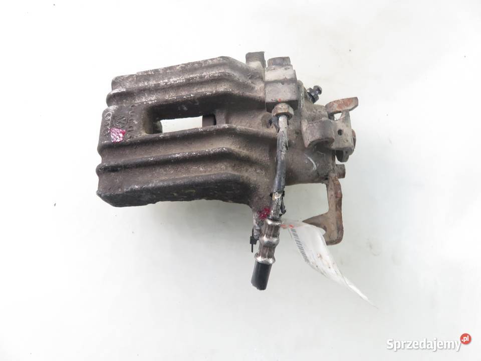 ZACISK LEWY TYŁ VW BORA