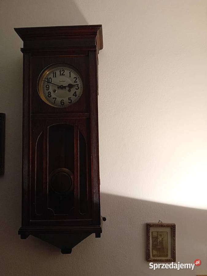 zegar ścienny Gustaw Beker okres międzywojnia brązowy