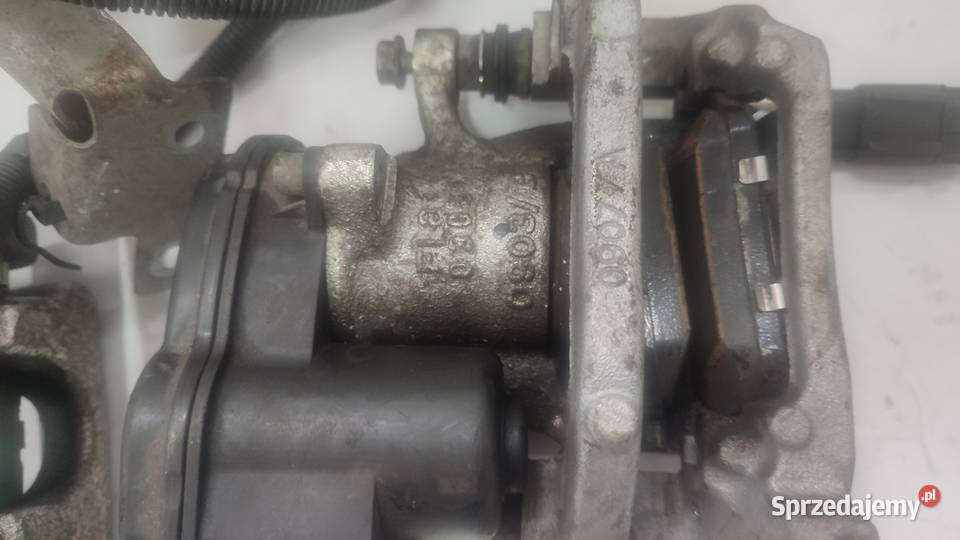 ZACISK TYŁ PRAWY LEWY ELEKTRYCZNY NISSAN QASHQAI Włoszczowa sprzedam