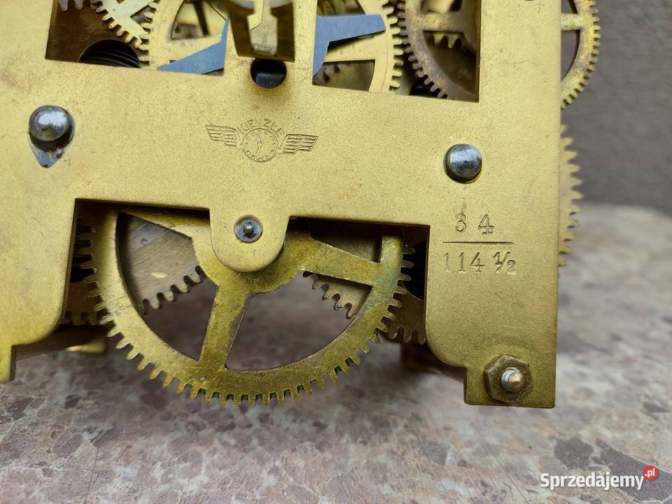 569 Mechanizm starego małego zegara ściennego Antyki Tczew