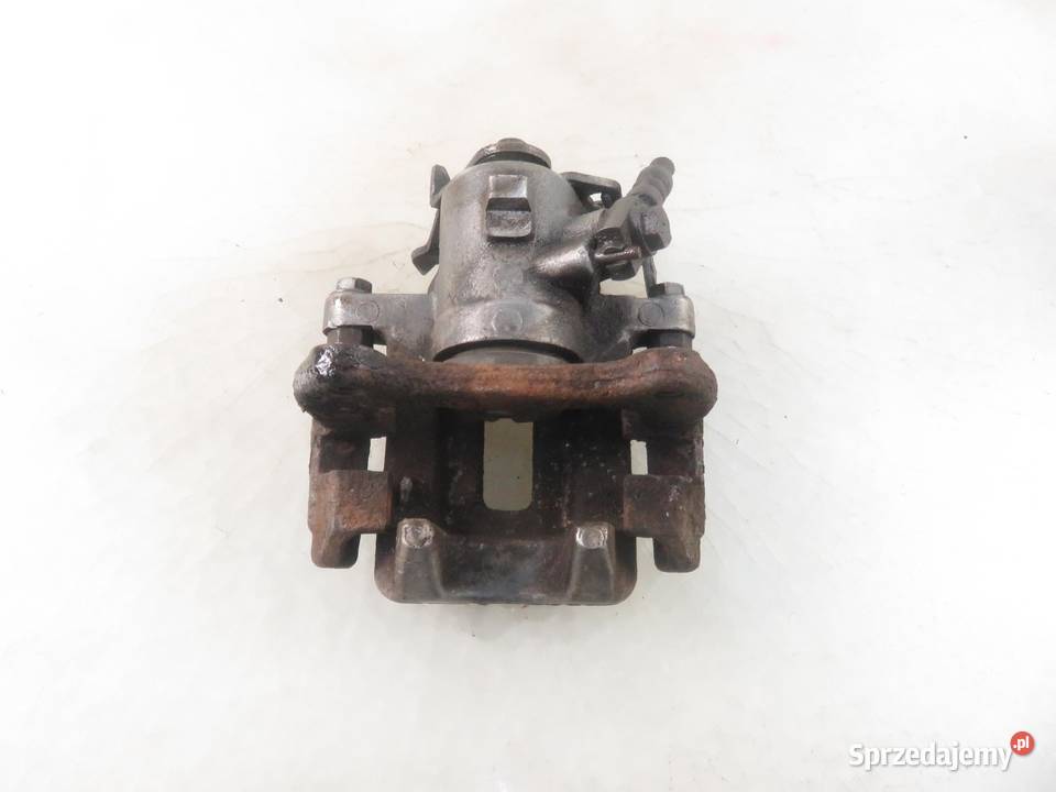 ZACISK PRAWY TYŁ AUDI A6 C5 KOMBI