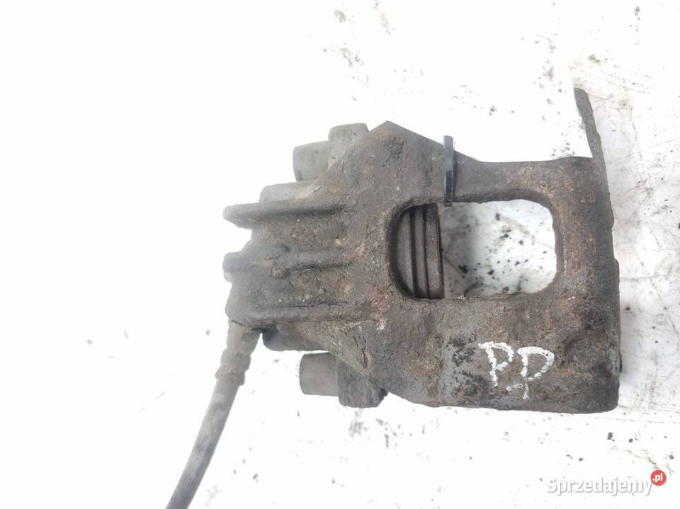 ZACISK HAMULCOWY PRZÓD PRAWY FORD FOCUS MK1 Lipno