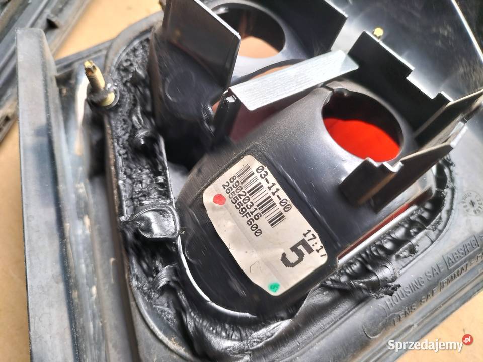 NISSAN PRIMERA P11 LIFT LAMPA TYŁ TYLNA LEWA osobowe