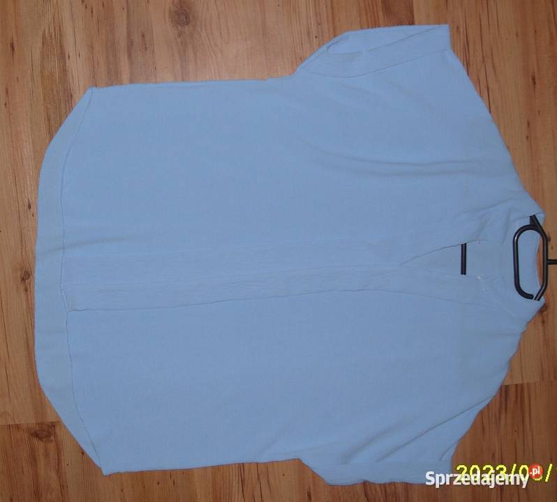 Baby Blue elegancka przewiewna bluzeczka r LXL z dekoltem Rawicz