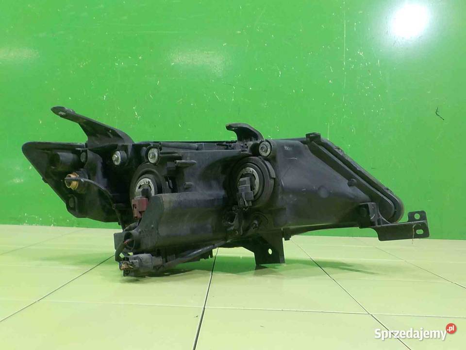 MITSUBISHI OUTLANDER II 20 DID 09r lampa lewa Lampy przednie Suków