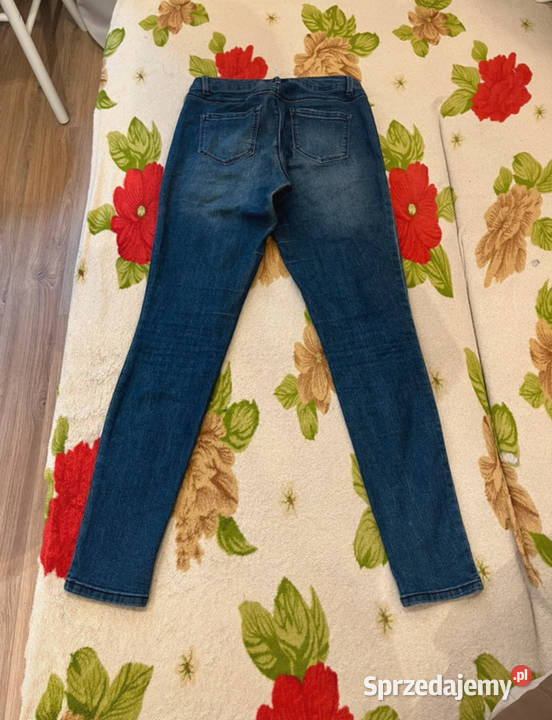 Ciemnoniebieskie obcisłe jeansy spodnie wiosna Bez wzoru