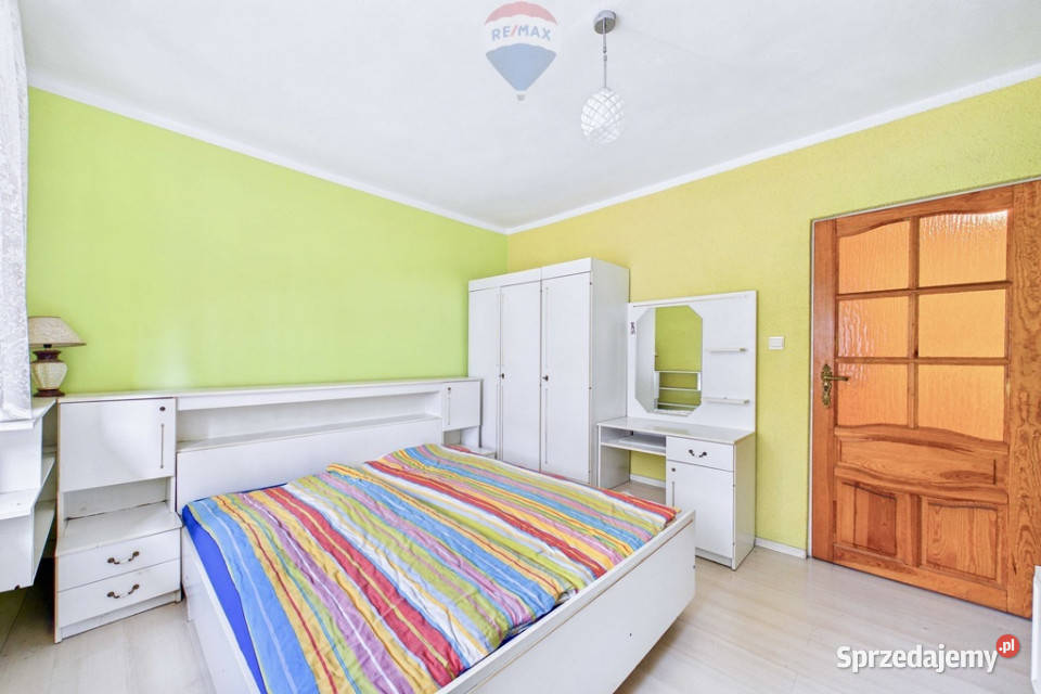 Dom jeziorem w mieszkania sprzedam