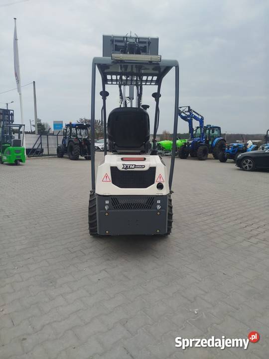 ŁADOWARKA PRZEGUBOWA XTM 106 ŁM Bedlno sprzedam