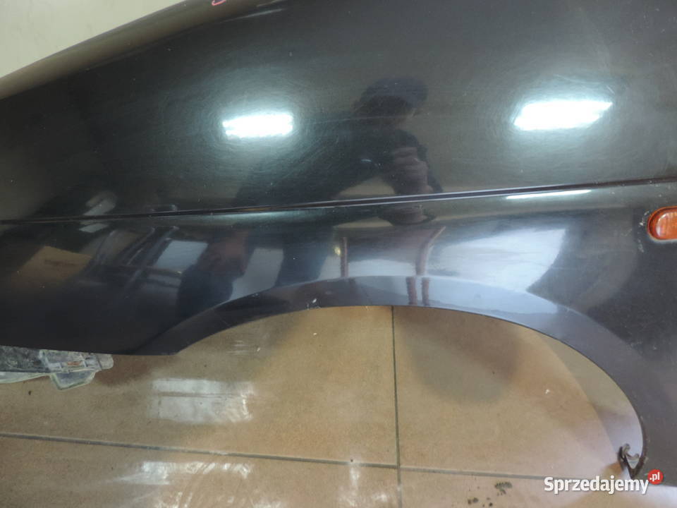 BŁOTNIK LEWY PRZEDNI RENAULT SCENIC 1 FL