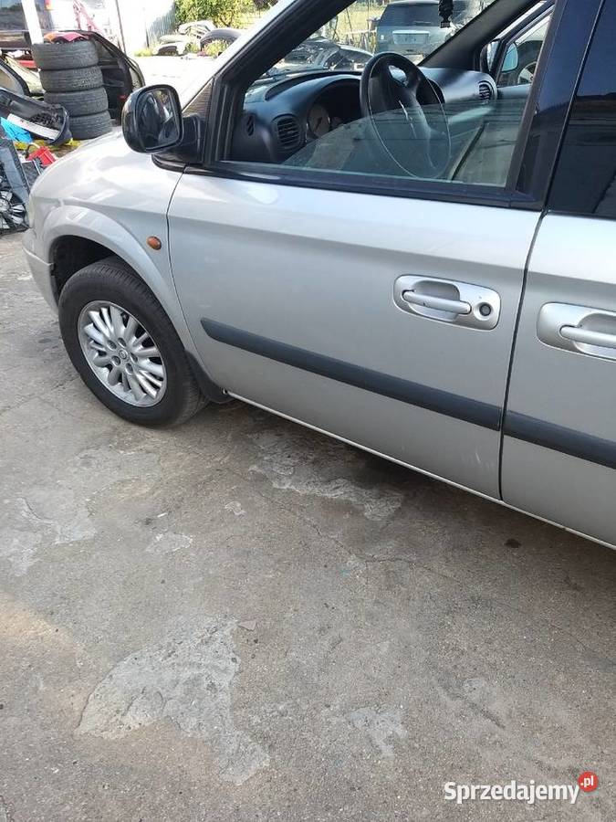 CHRYSLER GRAND VOYAGER DRZWI LEWE SREBRNE 0107 R
