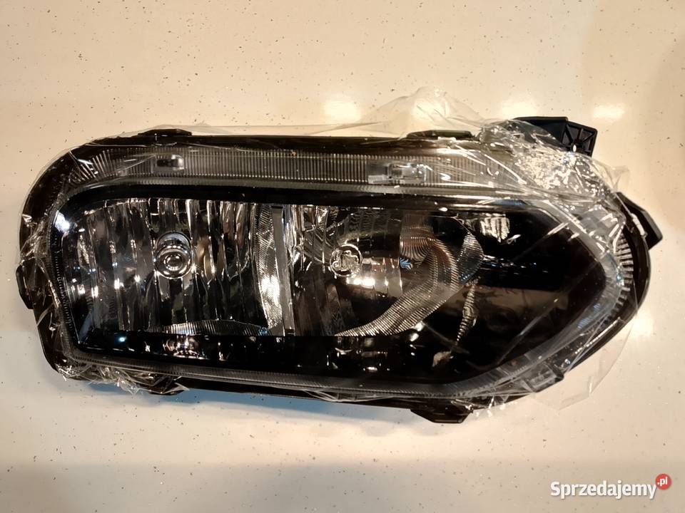 Fabrycznie nowy prawy reflektor Dacia Spring osobowe Zgierz