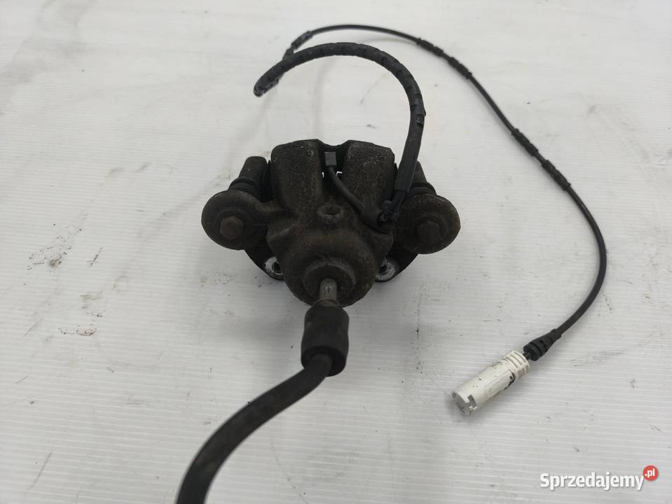 ZACISK LEWY PRZÓD BMW 1 E87 E81 LIFT 16 Zaciski i jarzma