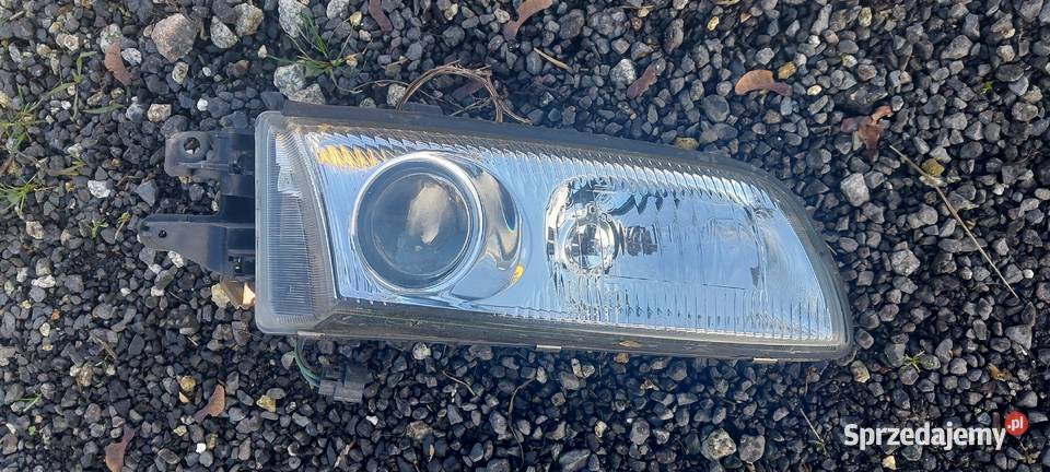 Xedos 9 1992 1997 lampa przednia prawa Byków