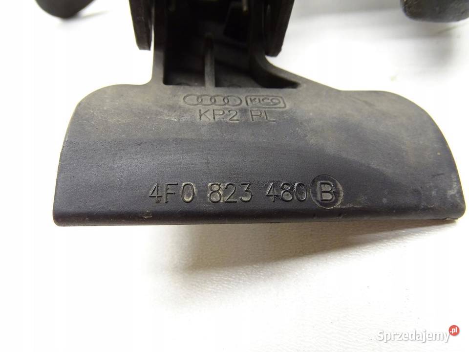 ZAMEK RYGIEL MASKI AUDI A6 C6 LIFT 4F0823480B