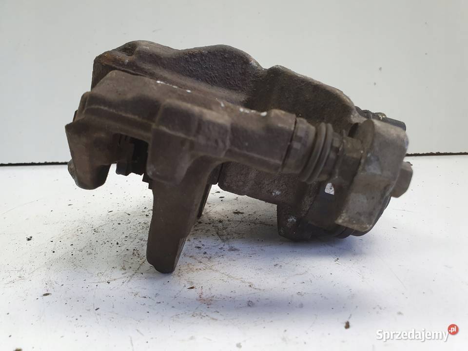 Toyota CHR TYLNY ZACISK HAMULCOWY prawy tył