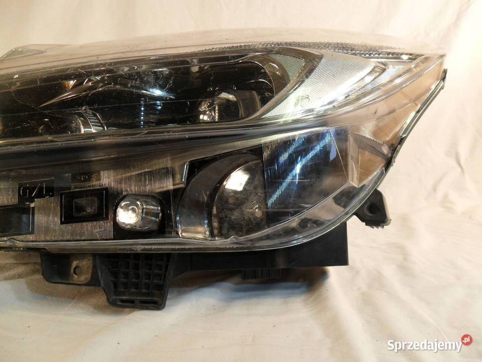 REFLEKTOR PRZÓD STRONA LEWA FORD S EM2B13W030EK Lampy przednie Nowy Tomyśl