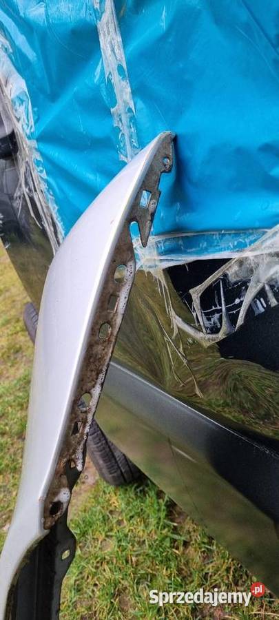 Mercedes w203 C klasa blotnik lewy