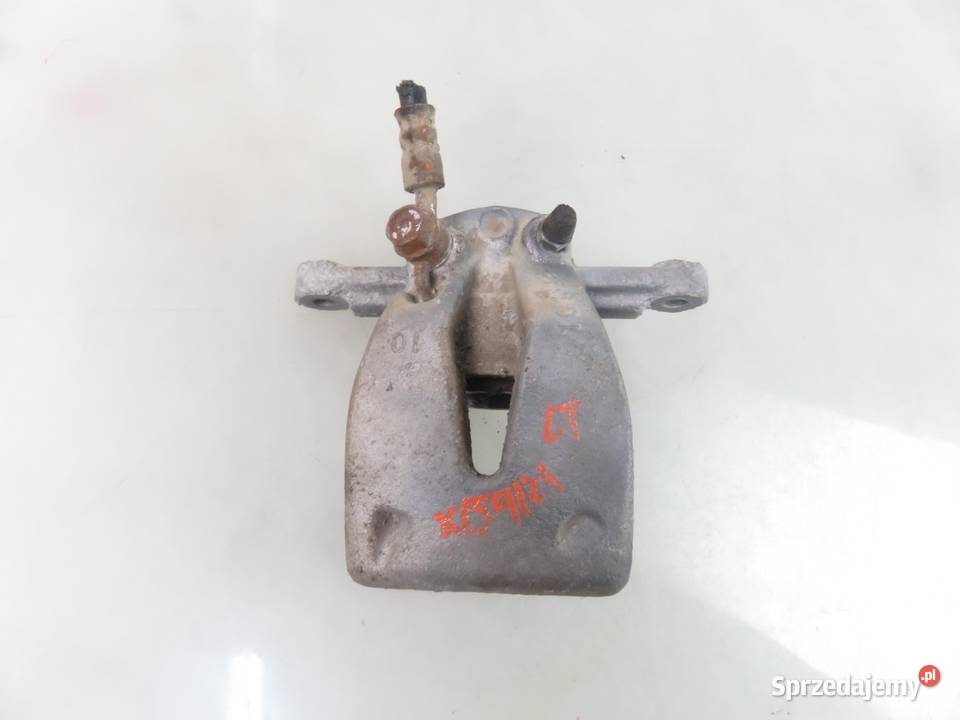 ZACISK LEWY TYŁ TOYOTA AVENSIS II T25