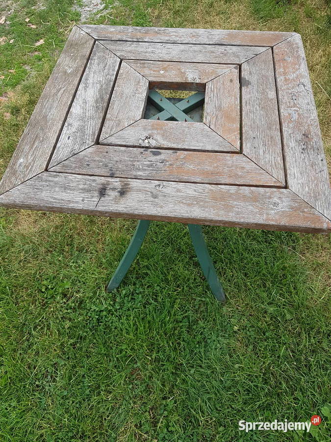 Stół ogrodowy drewniany na nodze zielonej metalowej