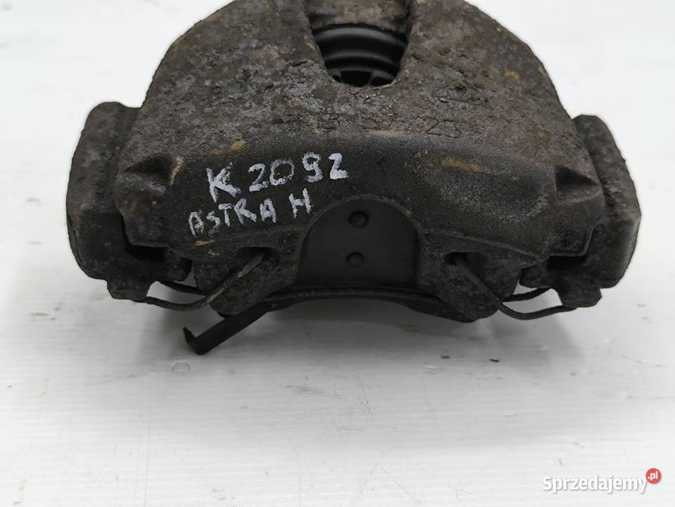 ZACISK LEWY PRZÓD OPEL ASTRA H 17 CDTI Zaciski i jarzma