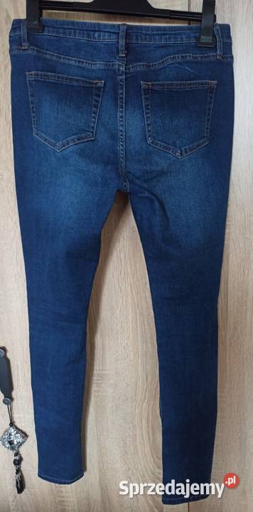 Niebieskie jeansy skinny z dziurami rozmiar 38 Radzyń Podlaski