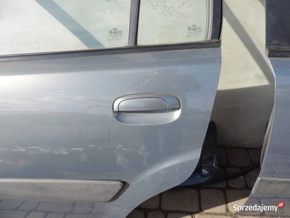 KIA RIO 2 HB 5D DRZWI LEWY TYŁ osobowe Nowy Sącz