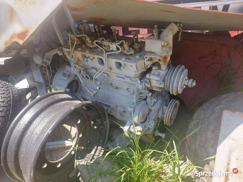 holland TL 100 Silnik skrzynia felga massey Wola Rzędzińska