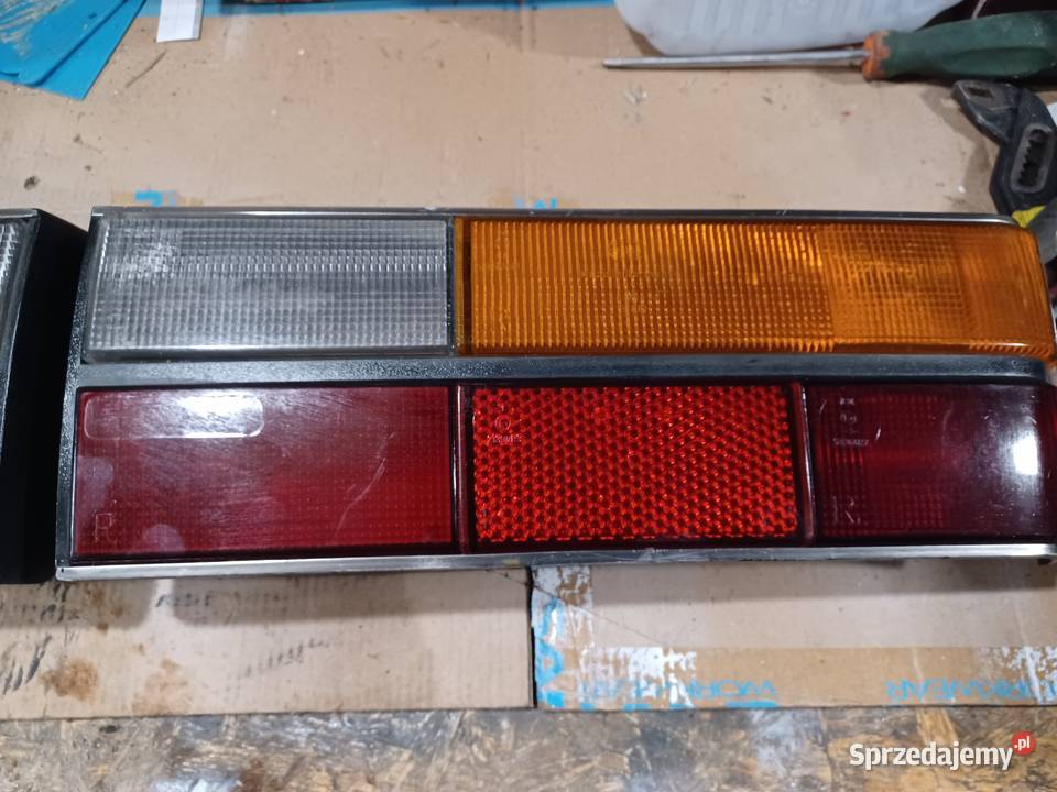 Audi 100 C2 lampy tylne lewą prawa komplet HELLA Grudziądz
