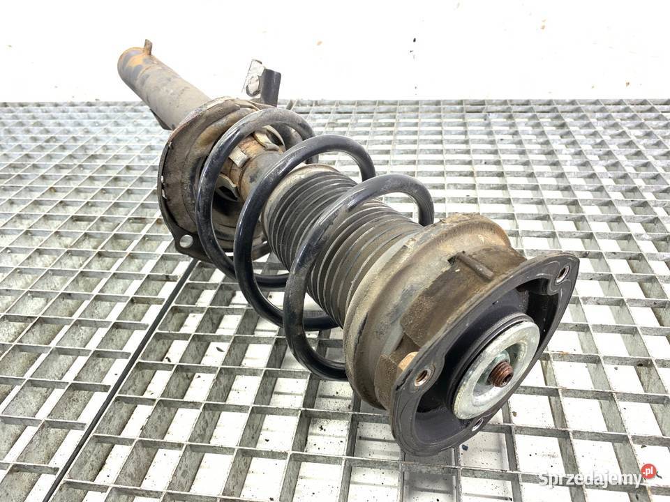 AMORTYZATOR LEWY PRZÓD ZE SPRĘŻYNĄ VW GOLF VII