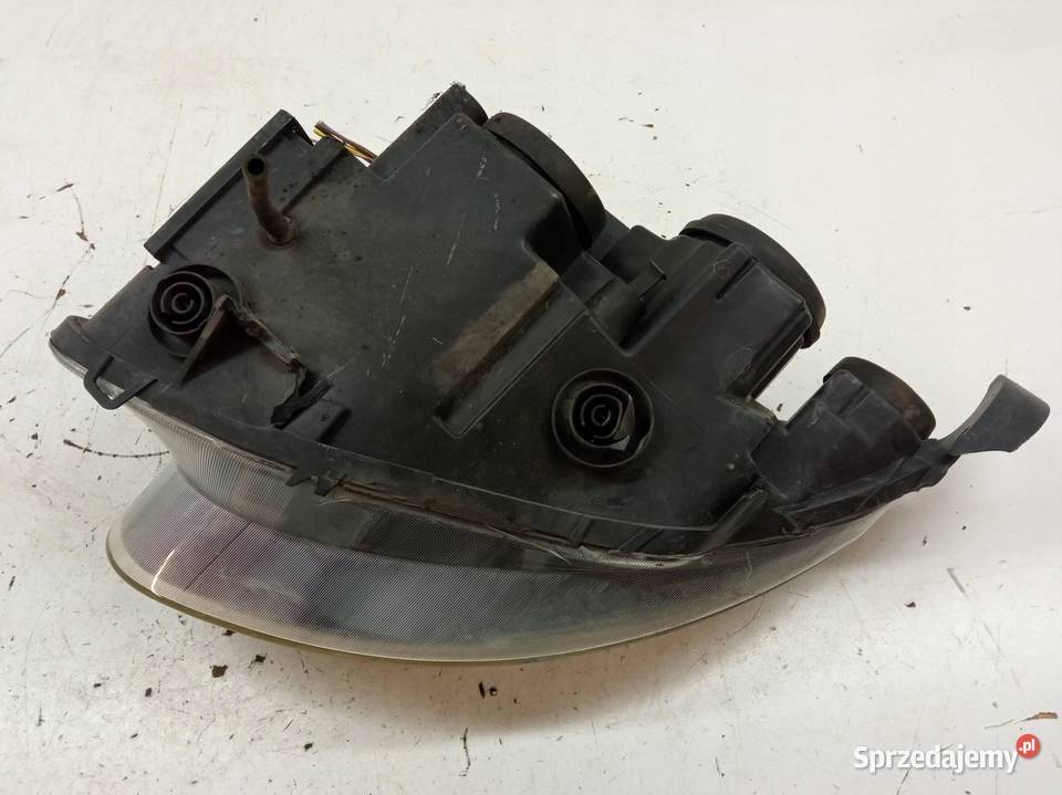 LAMPA PRZÓD PRAWA SOCZEWKA H7 EU USZKODZONA Saab