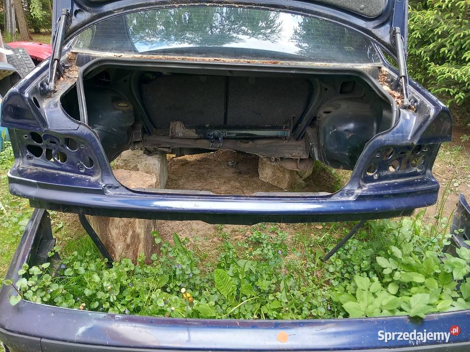 BMW e36 coupe błotik tył lewy prawy Pas tylny Brzozów