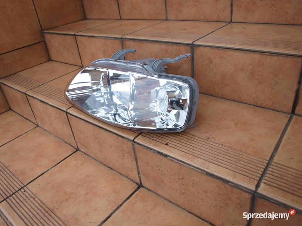 Chevrolet Aveo T200 lampa lewa przód europa Motoryzacja Kalisz