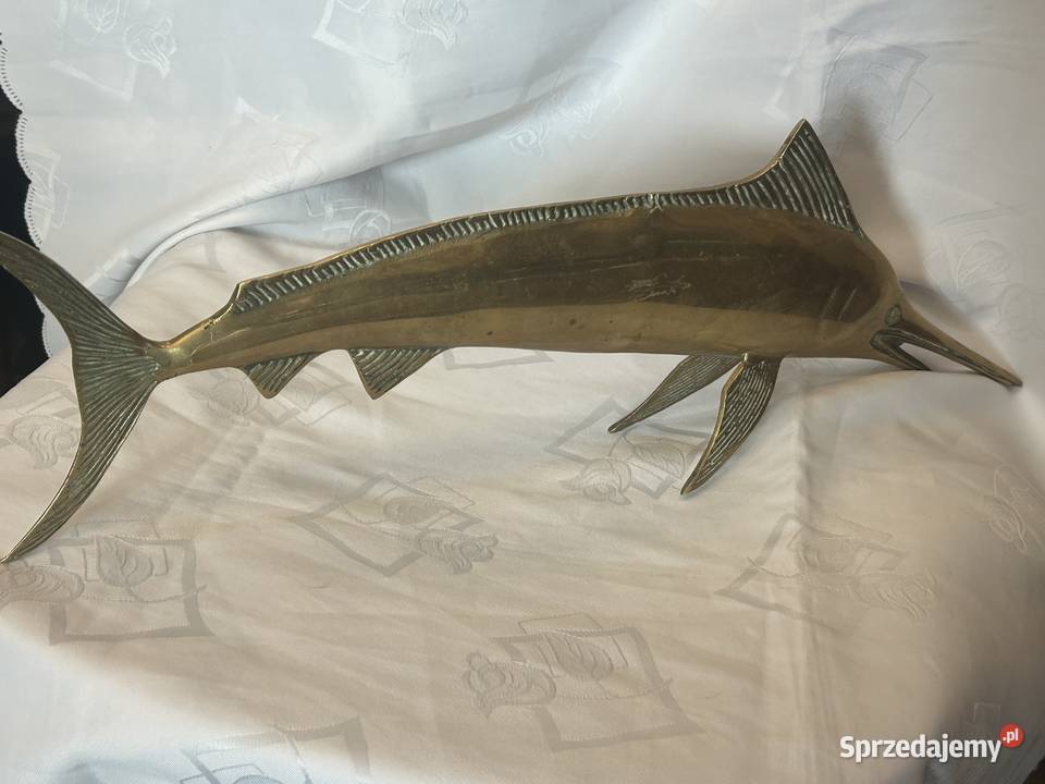 Mosiężna ryba włócznik
