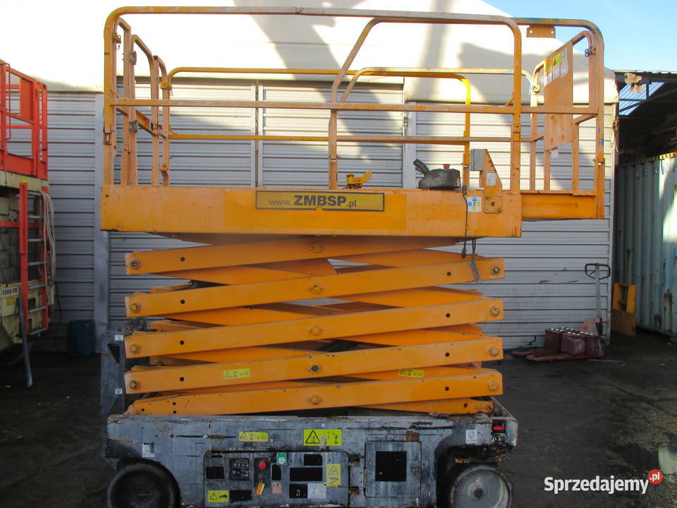 Podnośnik nożycowy 12 m Genie GS3246 UDT