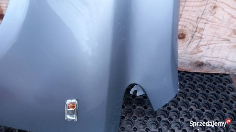 OPEL CORSA D BŁOTNIK PRZÓD LEWY Z163 osobowe